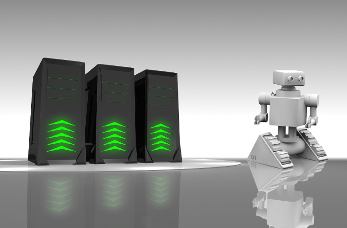 robot standing next to three server towers